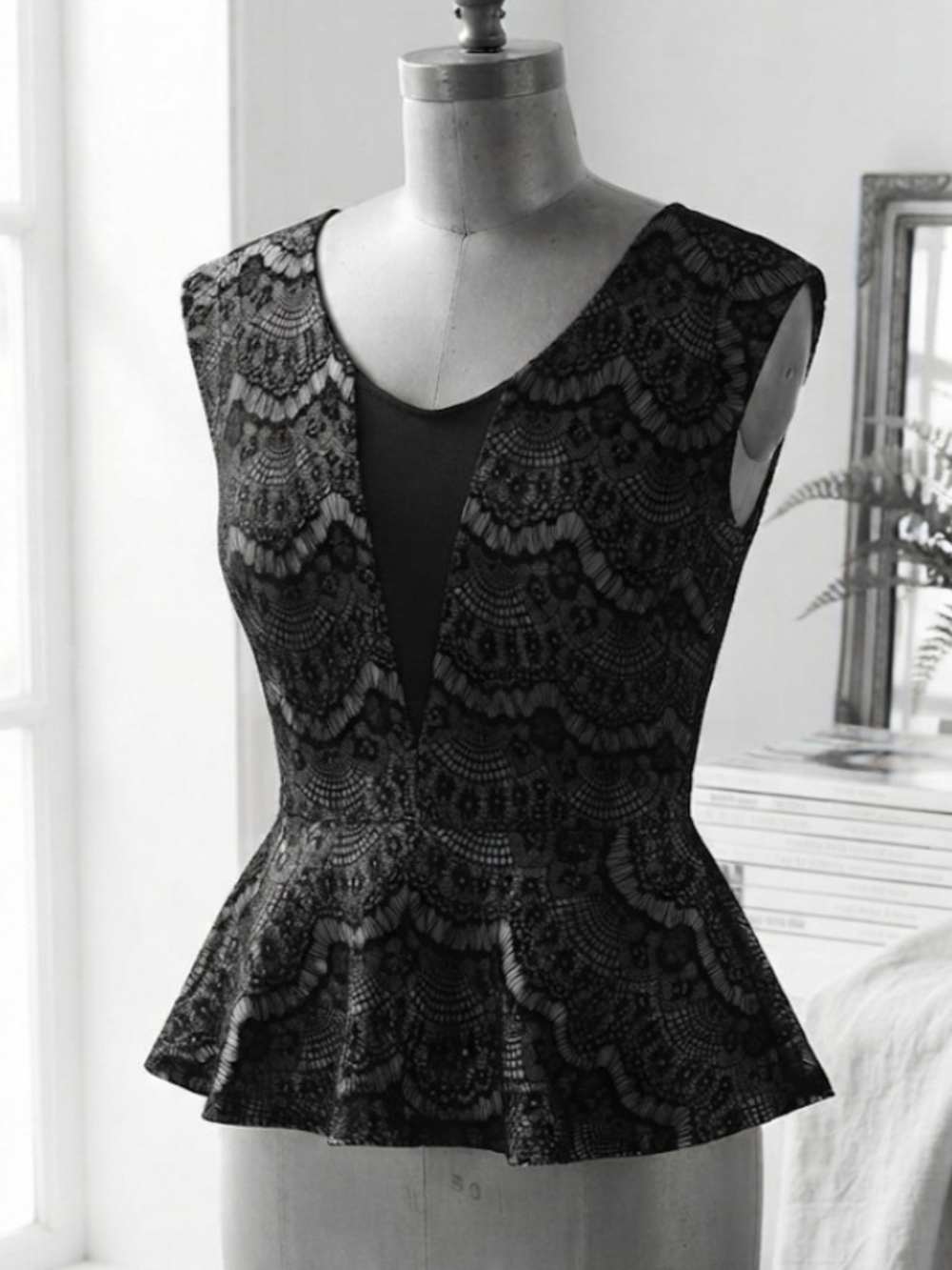 Lace Peplum Sleeveless Top in Black